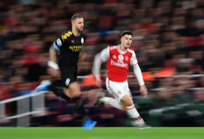 Framed Print : Martinelli vs. Walker: A Premier League Battle at Emirates Stadium Framed Print : Martinelli vs. Walker: A Premier League Battle at Emirates Stadium