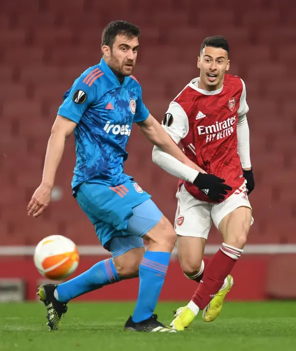 Framed Print : Martinelli's Empty Emirates Cross: Arsenal vs Olympiacos Europa League Showdown (2020-21)