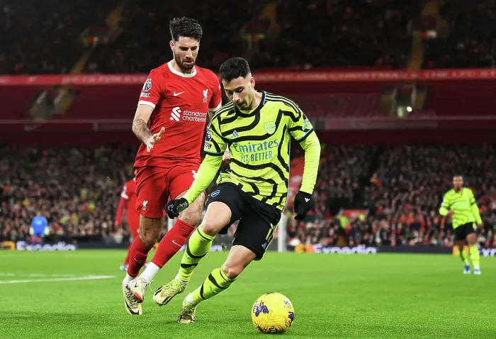 Framed Print : Martinelli's Intense Battle at Anfield: Arsenal vs. Liverpool (2023-24) Framed Print : Martinelli's Intense Battle at Anfield: Arsenal vs. Liverpool (2023-24)