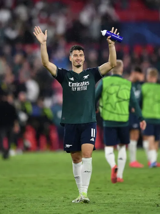 Framed Print : Martinelli's Wave: Arsenal Triumphs Over Sevilla in Champions League Group Stage