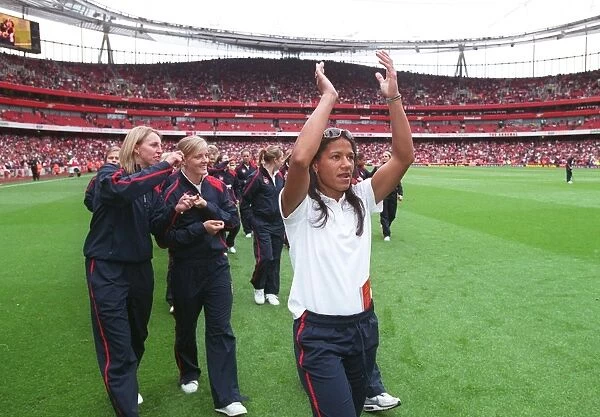 Mary Phillip (Arsenal Ladies) on the pitch at half time to parade the Womens
