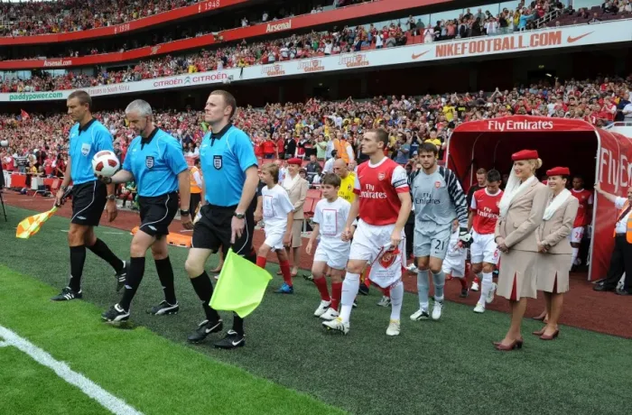 Framed Print : The match officials and Thomas Vermaelen (Arsenal). Arsenal 1: 1 AC Milan