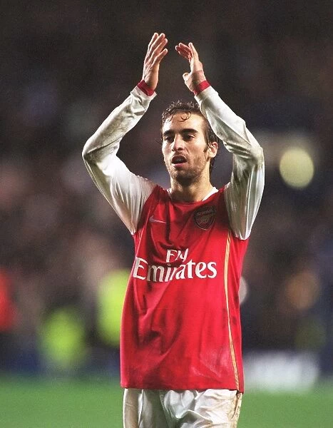 Mathieu Flamini (Arsenal) claps the fans at the end of the match