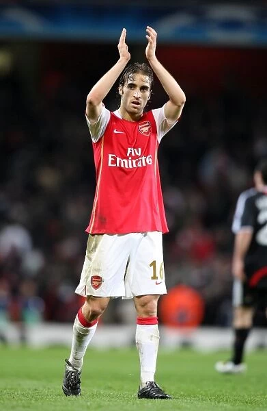 Mathieu Flamini (Arsenal) claps the fans after the match