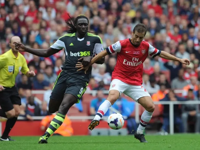 Framed Print : Mathieu Flamini (Arsenal) Kenwyne Jones (Stoke). Arsenal 3: 1 Stoke City. Barclays Premier League Framed Print : Mathieu Flamini (Arsenal) Kenwyne Jones (Stoke). Arsenal 3: 1 Stoke City. Barclays Premier League