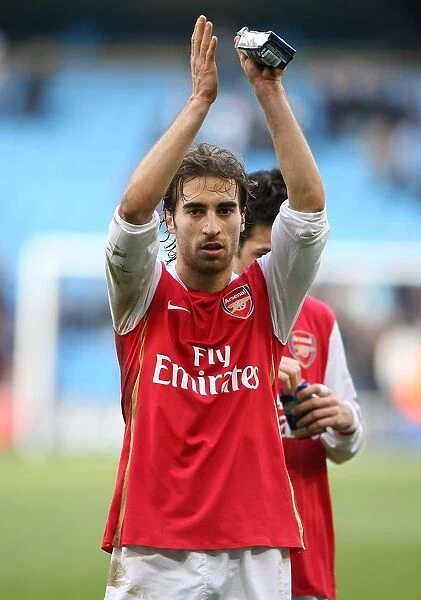 Mathieu Flamini salutes the Arsenal after the match