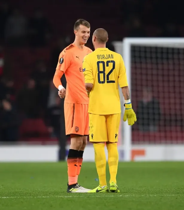 Framed Print : Matt Macey and Ricardinho Clash After Arsenal's Europa League Encounter vs Crvena Zvezda