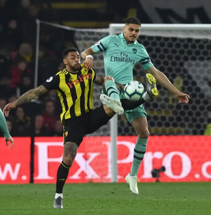 Framed Print : Mavropanos vs. Gray: A Premier League Battle - Arsenal vs. Watford