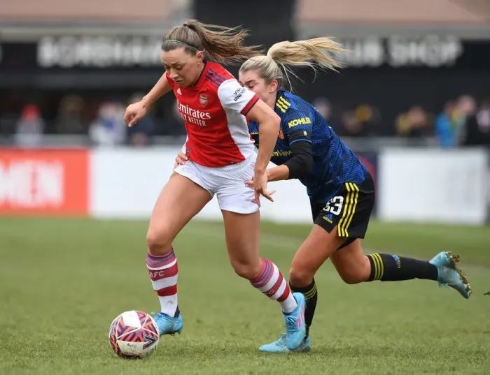 Framed Print : McCabe vs Russo: A Showdown in FA WSL Clash - Arsenal Women vs Manchester United Women