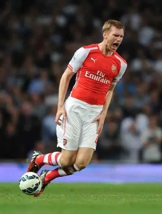 Framed Print : Per Mertesacker in Action: Arsenal vs. Tottenham Premier League Clash (2014-15) Framed Print : Per Mertesacker in Action: Arsenal vs. Tottenham Premier League Clash (2014-15)