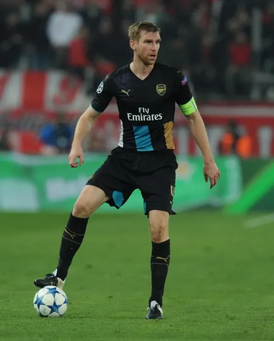 Framed Print : Per Mertesacker in Action: Arsenal vs. Olympiacos, UEFA Champions League, Athens 2015 Framed Print : Per Mertesacker in Action: Arsenal vs. Olympiacos, UEFA Champions League, Athens 2015