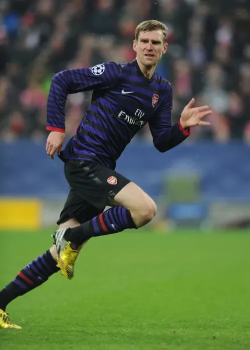 Framed Print : Per Mertesacker in Action: Arsenal vs. Bayern Munich, UEFA Champions League 2012-13 Framed Print : Per Mertesacker in Action: Arsenal vs. Bayern Munich, UEFA Champions League 2012-13