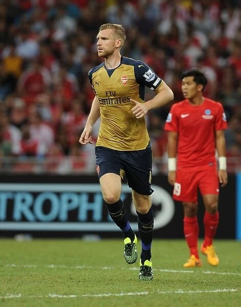 Per Mertesacker in Action: Arsenal vs. Singapore XI, Barclays Asia Trophy