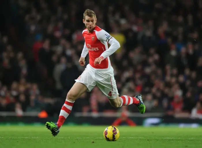 Framed Print : Per Mertesacker in Action: Arsenal vs Southampton, Premier League 2014-15