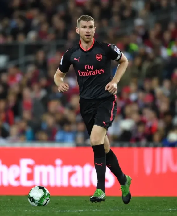Framed Print : Per Mertesacker in Action: Arsenal's Pre-Season Clash against Sydney FC (2017)