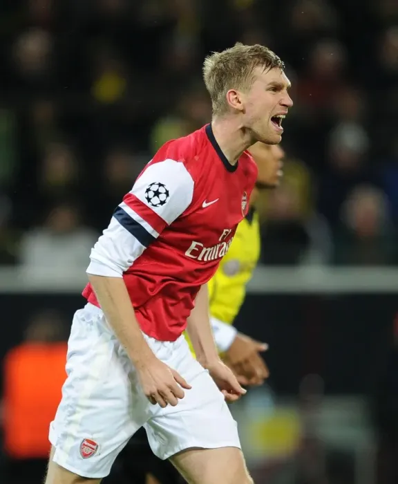 Framed Print : Per Mertesacker in Action: Borussia Dortmund vs. Arsenal, UEFA Champions League (2013)