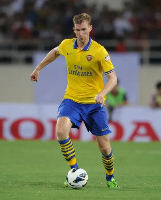 Framed Print : Per Mertesacker in Action: Vietnam vs. Arsenal (2013)