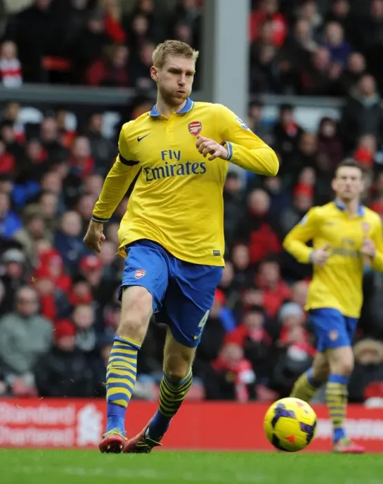 Framed Print : Per Mertesacker at Anfield: Liverpool vs Arsenal, Premier League 2013-14 Framed Print : Per Mertesacker at Anfield: Liverpool vs Arsenal, Premier League 2013-14