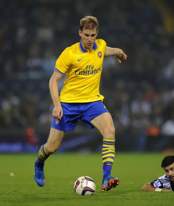 Framed Print : Per Mertesacker of Arsenal in Action against West Bromwich Albion - Capital One Cup, 2013