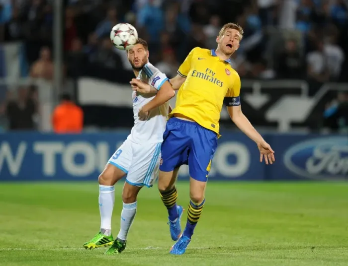 Framed Print : Per Mertesacker (Arsenal) Andre-Pierre Gignac (Marseille). Olympic Marseille 1: 2 Arsenal