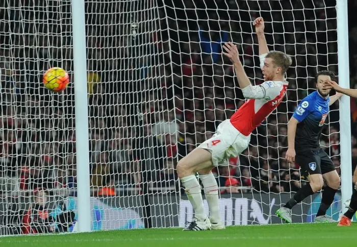 Framed Print : Per Mertesacker (Arsenal). Arsenal 2: 0 Bournemouth