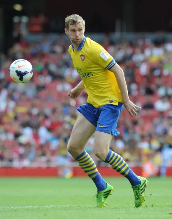 Framed Print : Per Mertesacker (Arsenal). Arsenal 2: 2 Napoli. Emirates Cup Day One. Emirates Stadium, 3  /  8  /  13