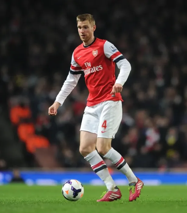 Framed Print : Per Mertesacker (Arsenal). Arsenal 2: 2 Swansea City. Barclays Premier League. Emirates Stadium Framed Print : Per Mertesacker (Arsenal). Arsenal 2: 2 Swansea City. Barclays Premier League. Emirates Stadium
