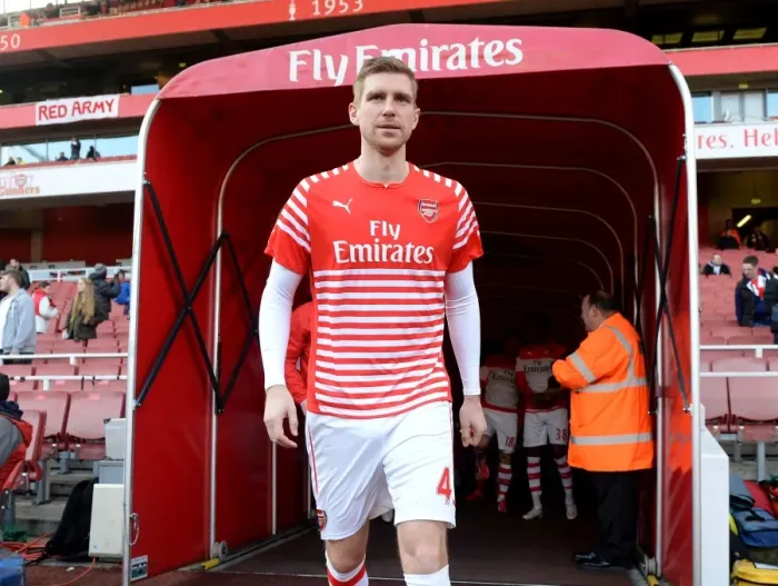 Framed Print : Per Mertesacker (Arsenal). Arsenal 3: 0 West Ham United. Barclays Premier League. Emirates Stadium