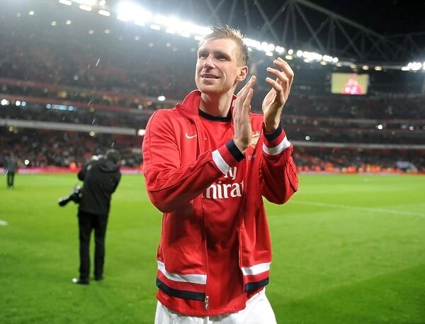 Per Mertesacker (Arsenal) during the lap of appreciation at the end of the match