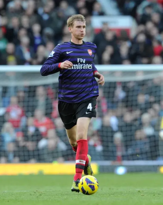 Framed Print : Per Mertesacker (Arsenal). Manchester United 2: 1 Arsenal. Barclays Premier League