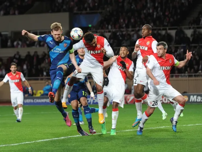 Framed Print : Per Mertesacker (Arsenal) Nabil Dirar (Monaco). AS Monaco 0: 2 Arsenal. UEFA Champions League Framed Print : Per Mertesacker (Arsenal) Nabil Dirar (Monaco). AS Monaco 0: 2 Arsenal. UEFA Champions League