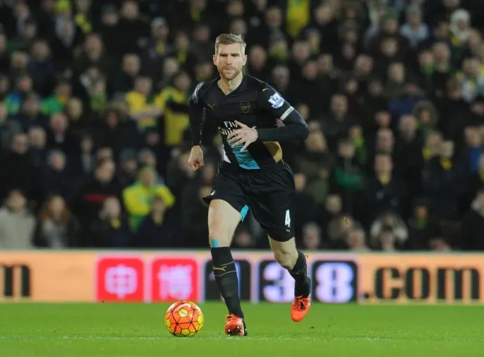 Framed Print : Per Mertesacker (Arsenal). Norwich City 1: 1 Arsenal. Barclays Premier League. Carrow Road
