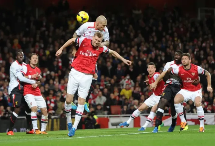 Framed Print : Per Mertesacker (Arsenal0 Martin Skrtel (Liverpool). Arsenal 2: 0 Liverpool. Barclays Premier League