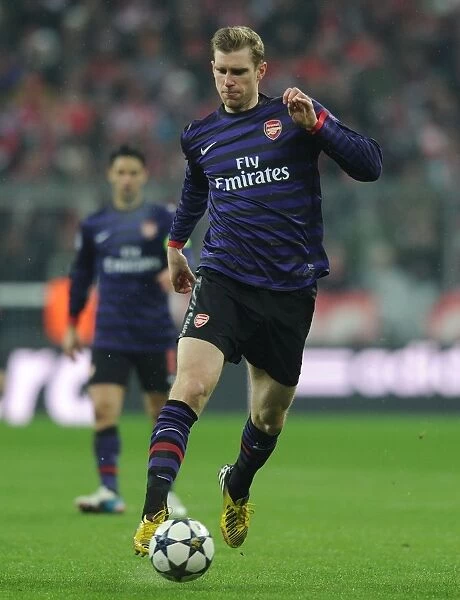 Per Mertesacker: Arsenal's Defiant Performance in Munich, UEFA Champions League 2012-13