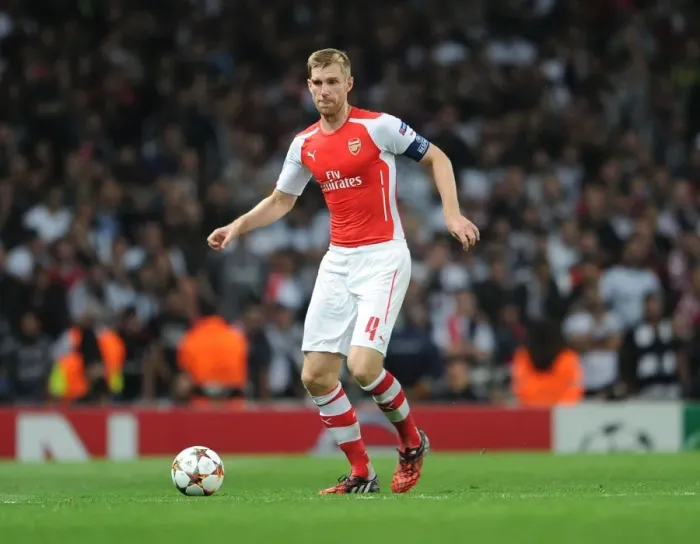 Framed Print : Per Mertesacker: Arsenal's Focused Defender Prepares for Champions League Showdown Against Besiktas Framed Print : Per Mertesacker: Arsenal's Focused Defender Prepares for Champions League Showdown Against Besiktas