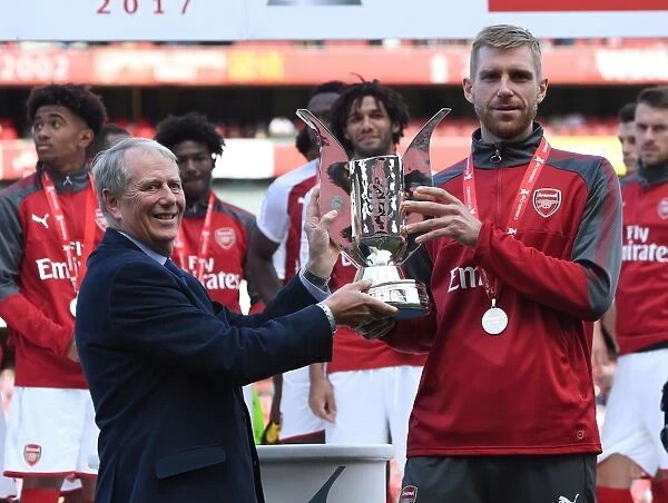 Per Mertesacker Celebrates Emirates Cup Victory with Arsenal