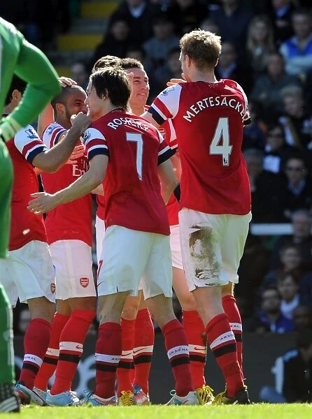 Per Mertesacker celebrates scoring his goal for Arsenal with Laurent Koscielny. Fulham 0: 1 Arsenal