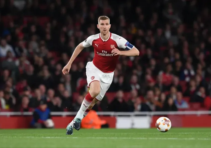 Framed Print : Per Mertesacker Focuses in Arsenal's Europa League Clash Against 1. FC Koeln