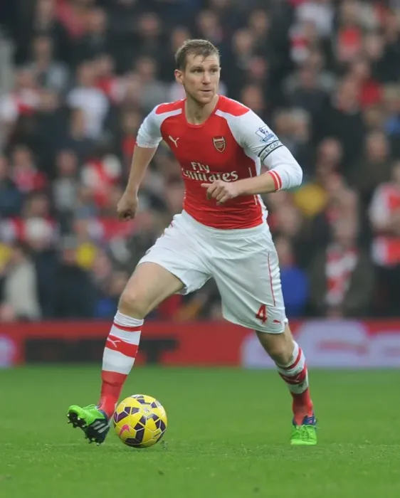 Framed Print : Per Mertesacker Focuses in Arsenal's Premier League Clash Against West Bromwich Albion (2014) Framed Print : Per Mertesacker Focuses in Arsenal's Premier League Clash Against West Bromwich Albion (2014)