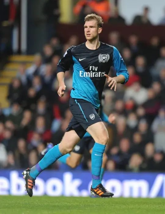 Framed Print : Per Mertesacker Focuses in Aston Villa vs Arsenal Premier League Clash (2011-12)