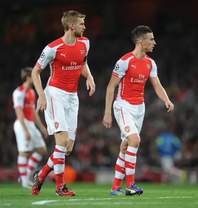 Framed Print : Per Mertesacker and Laurent Koscielny (Arsenal). Arsenal 1: 0 Besiktas. UEFA Champions