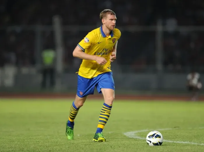 Framed Print : Per Mertesacker Leads Arsenal Against Indonesia All-Stars in 2013