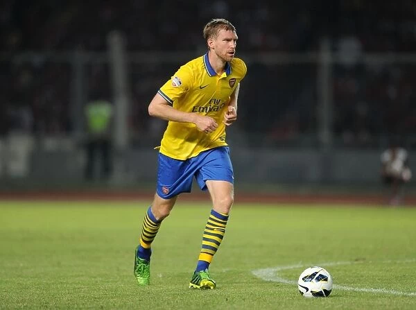 Per Mertesacker Leads Arsenal Against Indonesia All-Stars in 2013