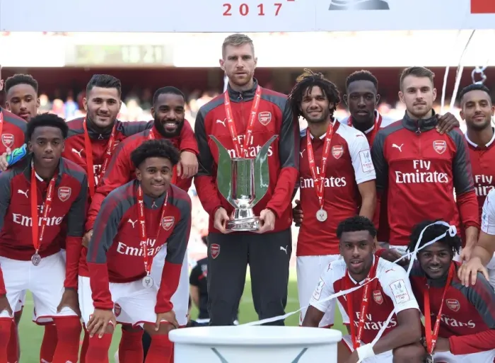 Framed Print : Per Mertesacker Lifts Emirates Cup: Arsenal's Victory over Sevilla FC (2017)