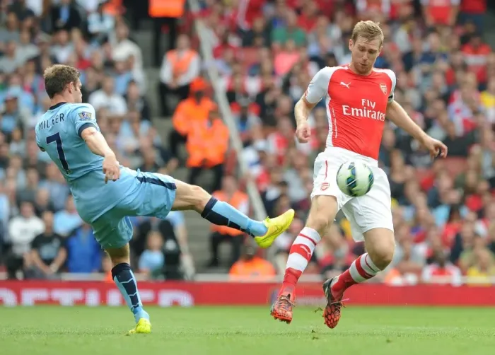 Framed Print : Per Mertesacker Outmaneuvers James Milner: Arsenal vs Manchester City, Premier League 2014-15 Framed Print : Per Mertesacker Outmaneuvers James Milner: Arsenal vs Manchester City, Premier League 2014-15