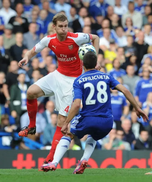 Framed Print : Mertesacker vs Azpilicueta: Intense Battle at Stamford Bridge - Chelsea vs Arsenal, Premier League 2014-15