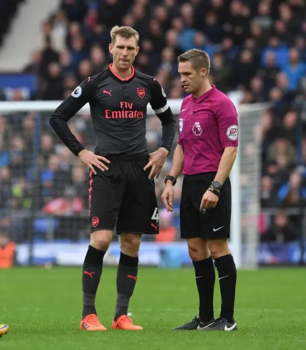 Framed Print : Per Mertesacker vs. Referee Craig Pawson: A Contentious Moment at Everton vs. Arsenal (2017-18) Framed Print : Per Mertesacker vs. Referee Craig Pawson: A Contentious Moment at Everton vs. Arsenal (2017-18)
