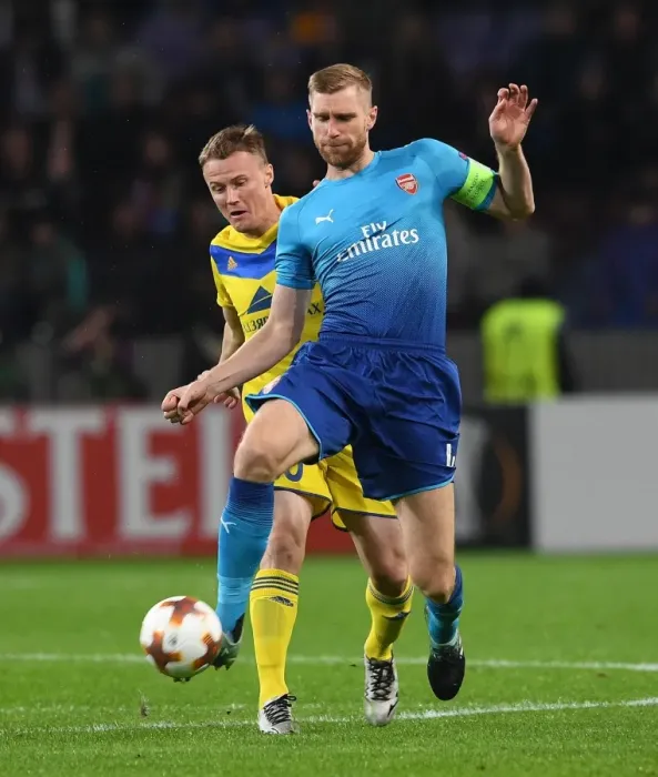 Framed Print : Per Mertesacker vs. Vitali Rodionov: A Europa League Showdown at Borisov-Arena