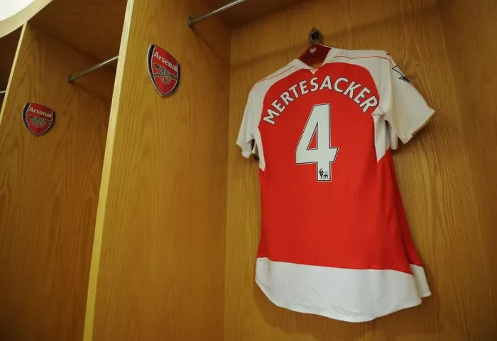 Framed Print : Per Mertesacker's Arsenal Shirt in Arsenal Changing Room Before Arsenal vs West Bromwich Albion (2015-16)