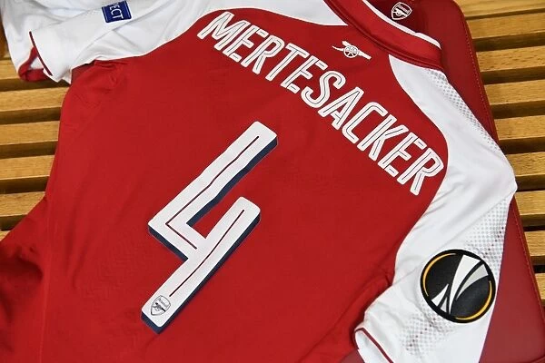 Per Mertesacker's Arsenal Shirt and Pennant in Arsenal Dressing Room (Arsenal v FC Köln, 2017-18)
